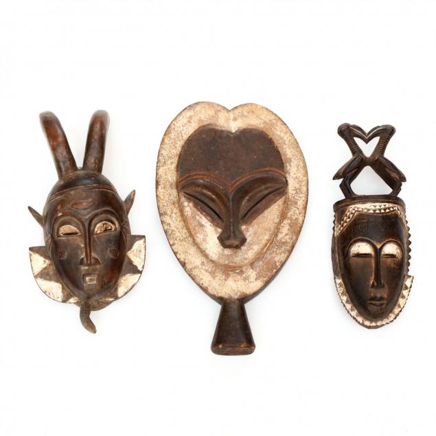 three-african-carved-wood-tribal-masks