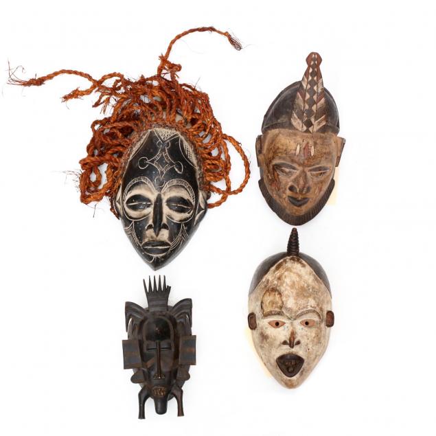 four-african-masks-one-senufo-one-chokwe-and-igbo-masks