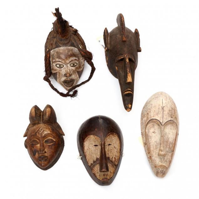 five-carved-and-painted-tribal-masks