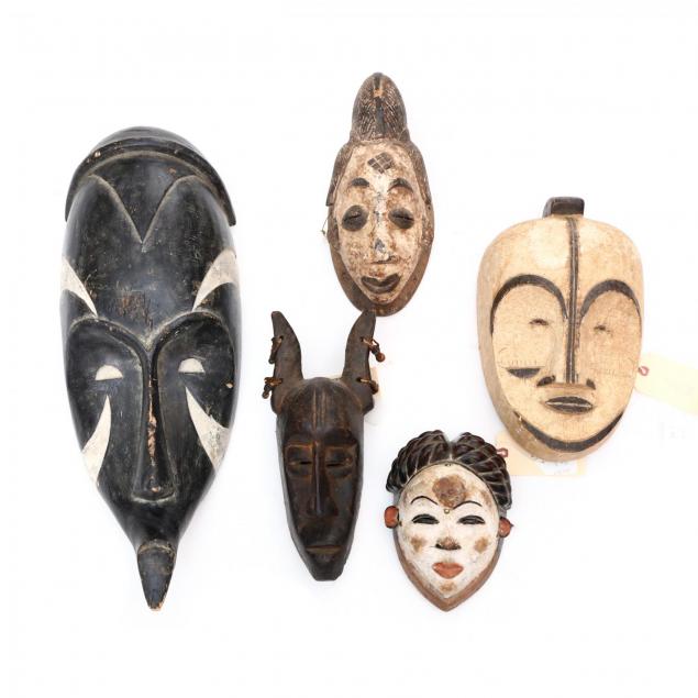 five-carved-and-painted-tribal-masks