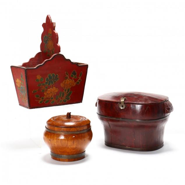 three-asian-wooden-storage-vessels