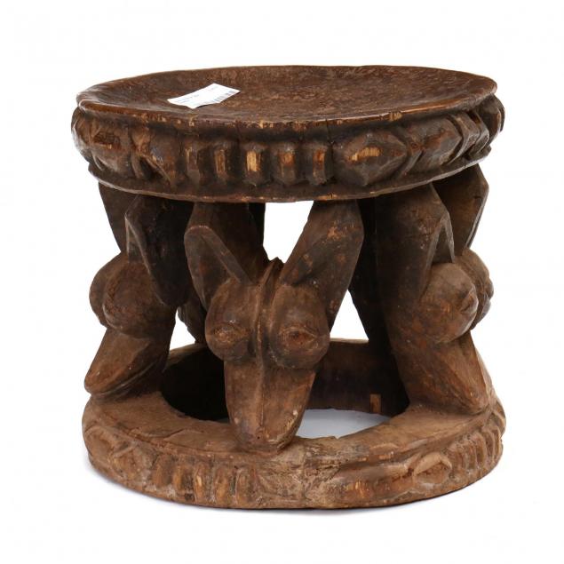 african-carved-wood-iconic-utilitarian-table-with-animal-heads