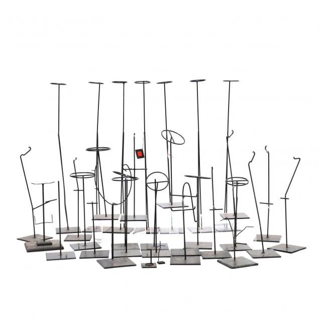 a-collection-of-iron-display-stands