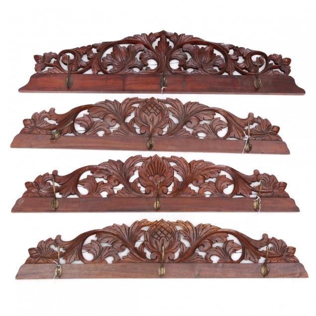 four-carved-hardwood-coat-racks