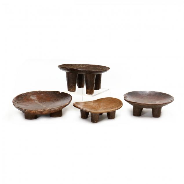 four-african-carved-wood-stools