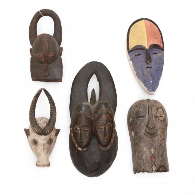 five-african-carved-tribal-masks
