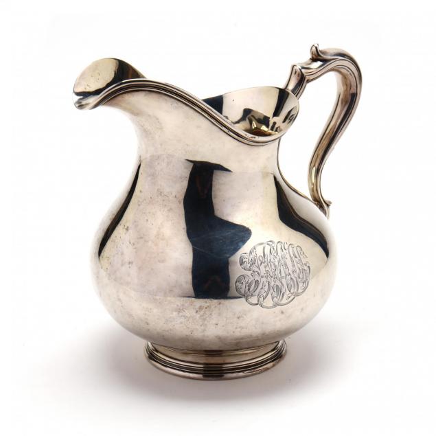 an-antique-sterling-silver-water-pitcher