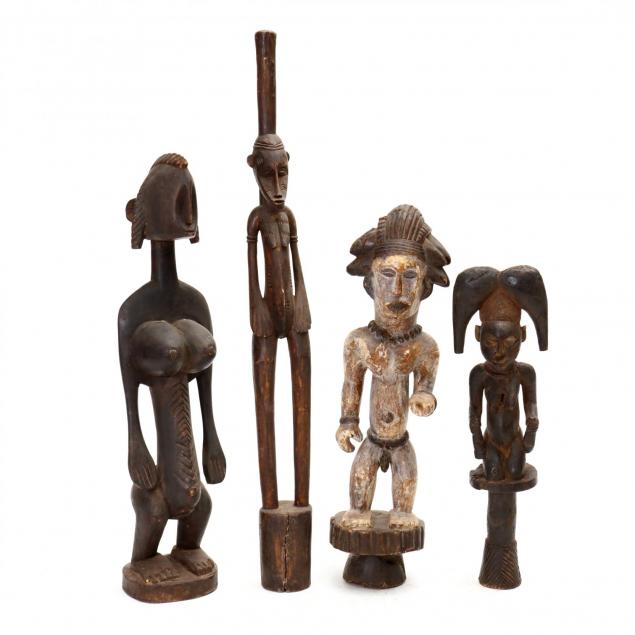 four-african-carved-tribal-statues