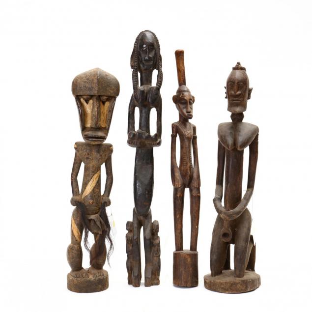 four-african-female-carved-tribal-statues