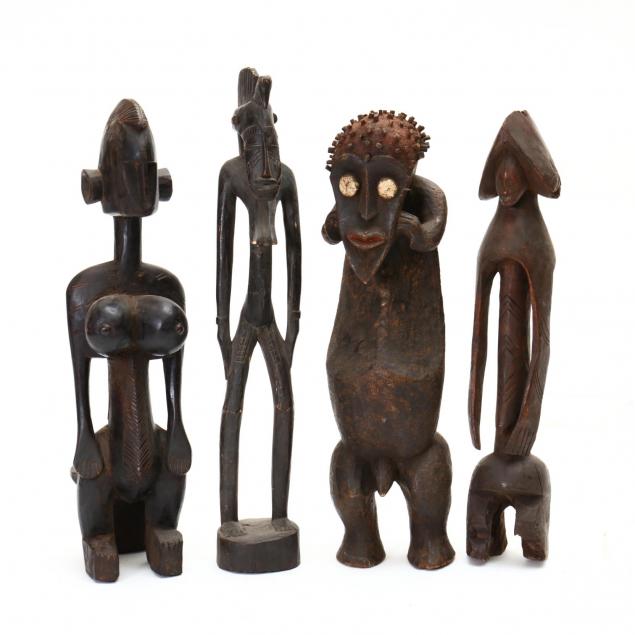 four-african-carved-tribal-statues