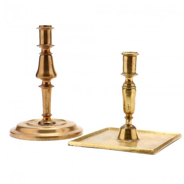 two-antique-brass-candlesticks