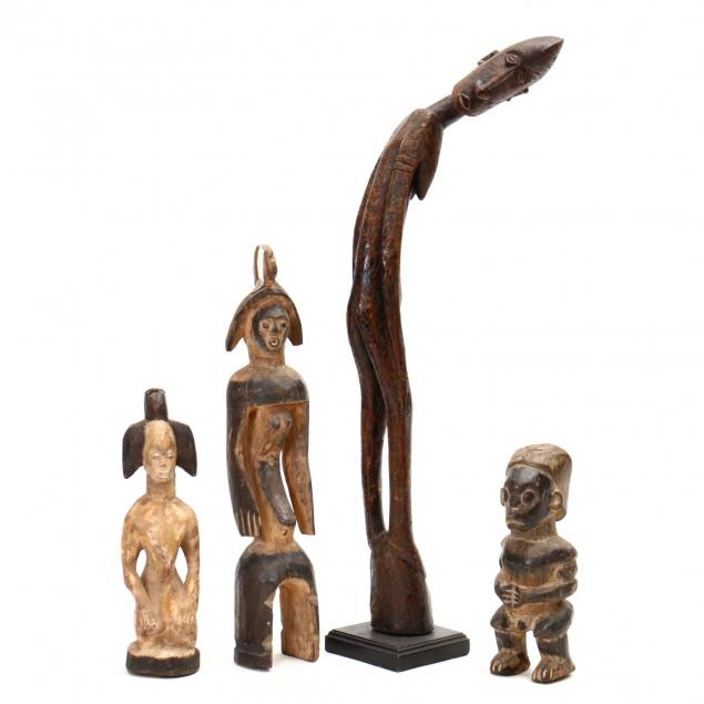 four-carved-african-figures