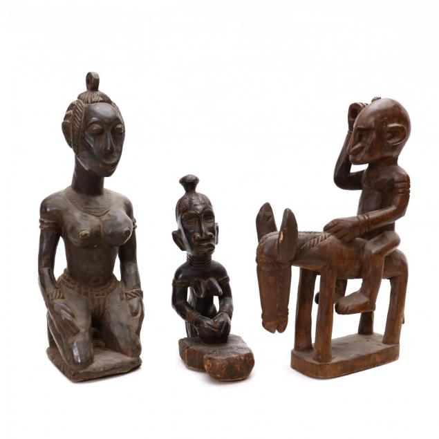 three-carved-african-figural-sculptures