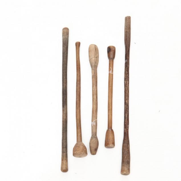 five-carved-wood-clubs