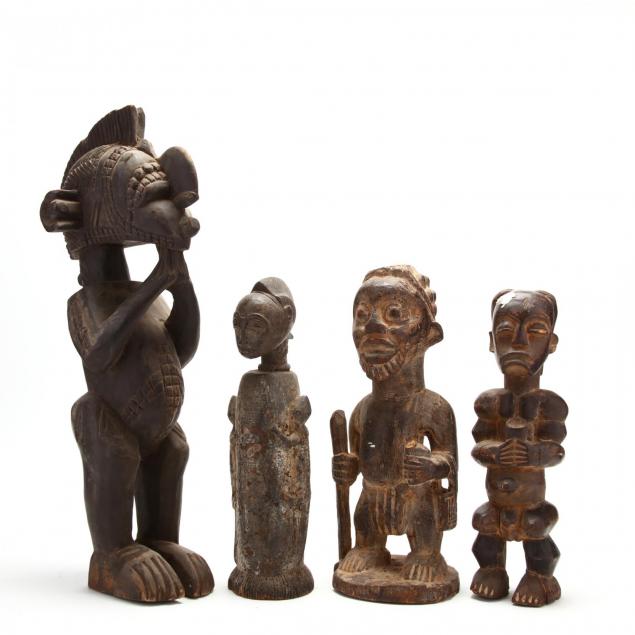 four-african-figural-carvings