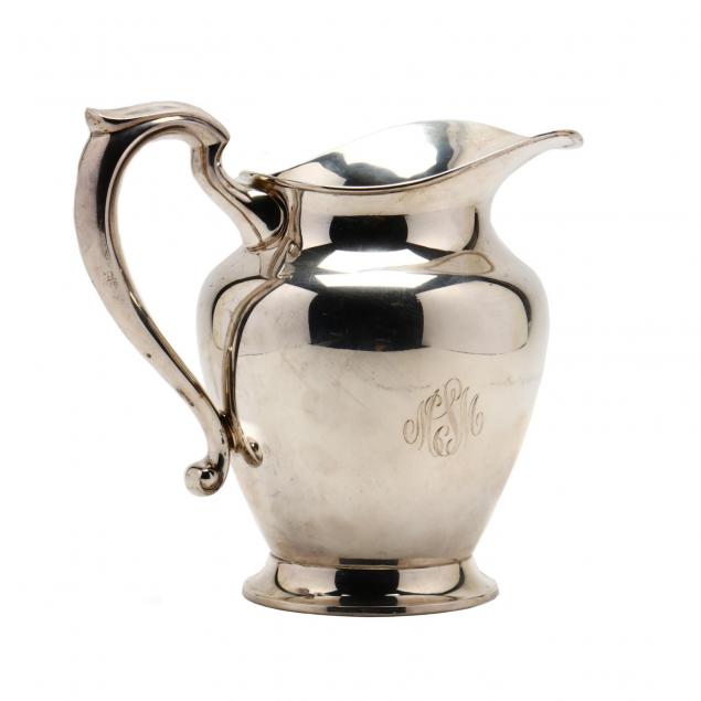a-sterling-silver-water-pitcher-by-reed-barton