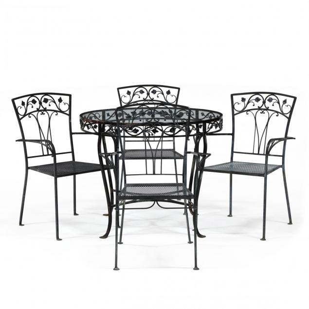 vintage-five-piece-wrought-iron-table-and-chairs