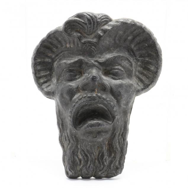 an-antique-lead-garden-mask