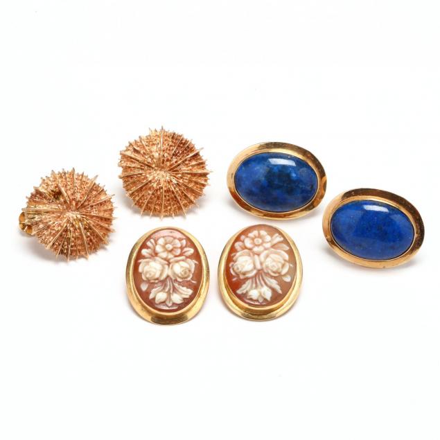 three-pairs-of-gold-earrings