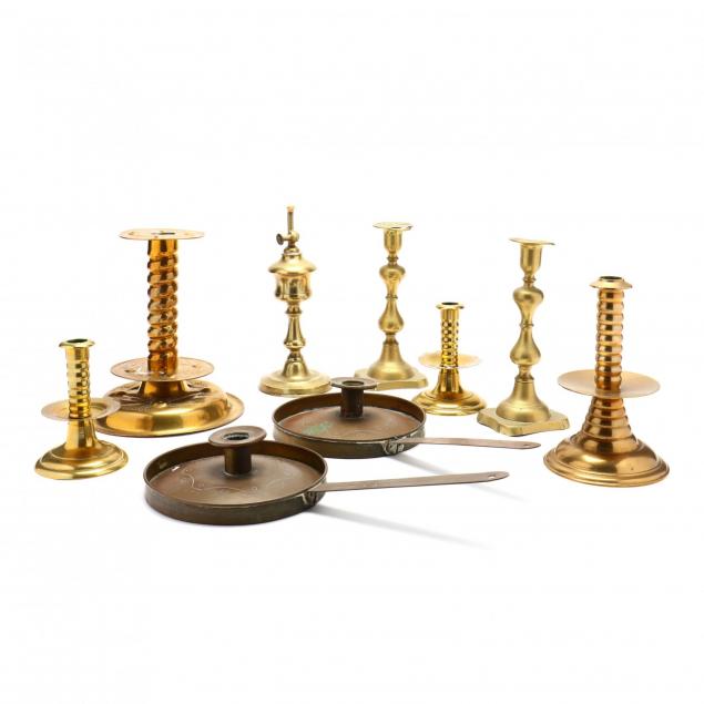 nine-brass-candlesticks