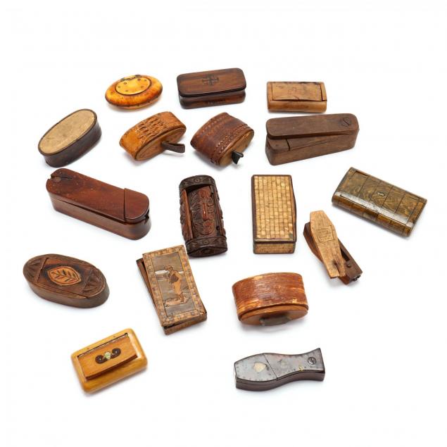 a-group-of-antique-wooden-snuff-containers
