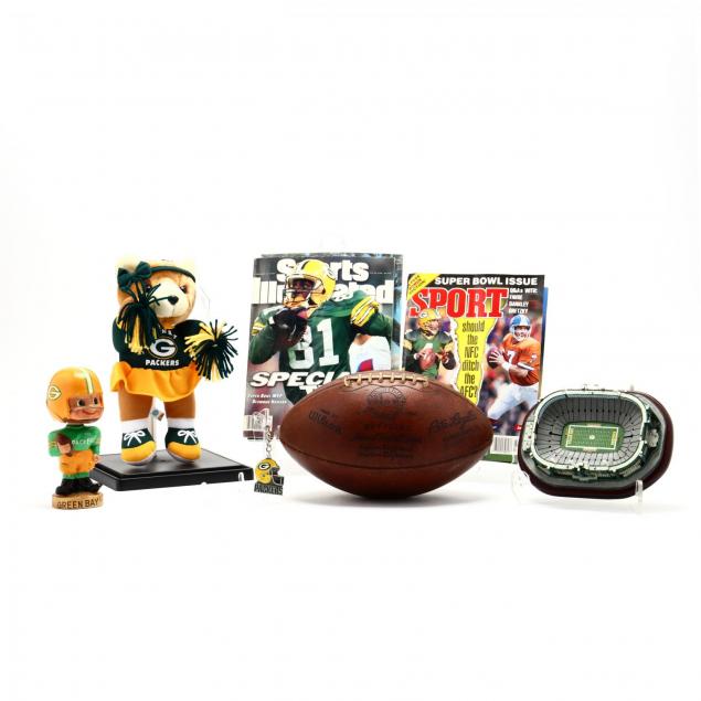 a-grouping-of-green-bay-packers-memorbilia
