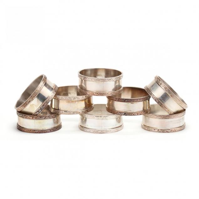 a-cased-set-of-eight-elizabeth-ii-silver-napkin-rings