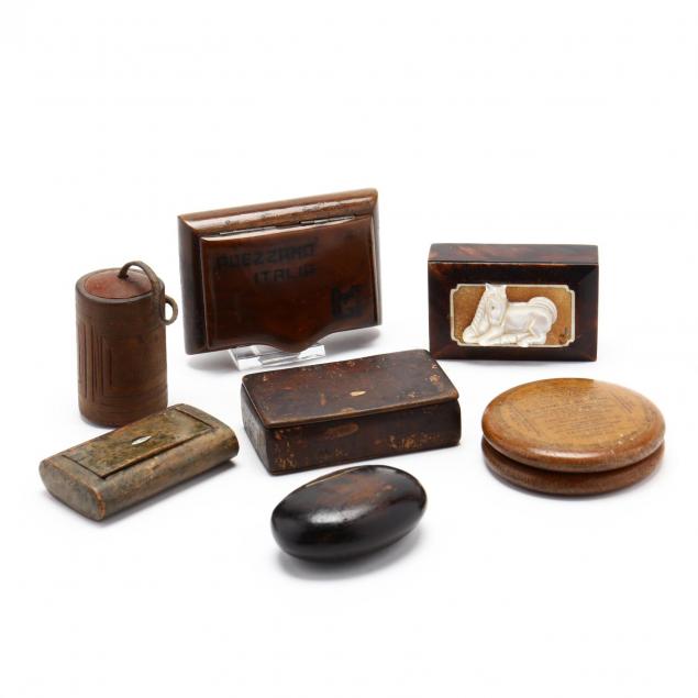 a-group-of-vintage-wooden-snuff-boxes
