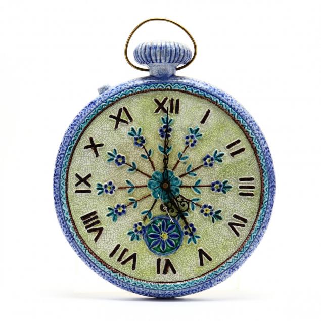 a-pottery-wall-clock