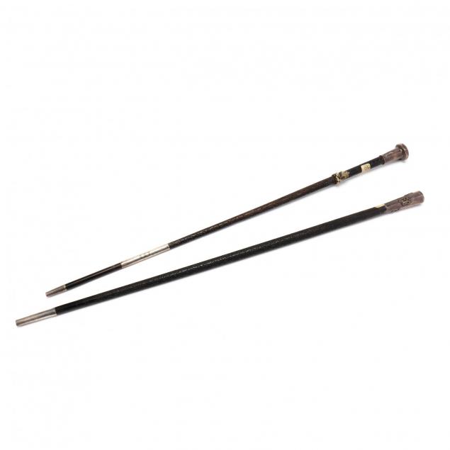 two-antique-carved-ebony-and-silver-mounted-swagger-sticks
