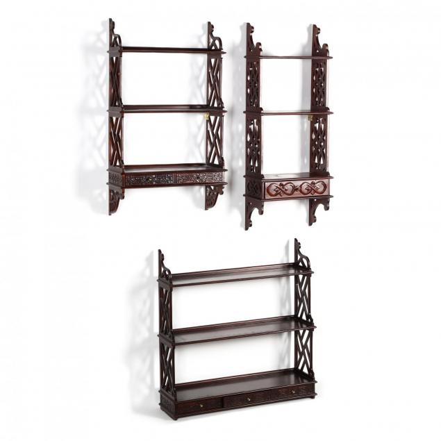 three-chippendale-style-carved-mahogany-hanging-shelves