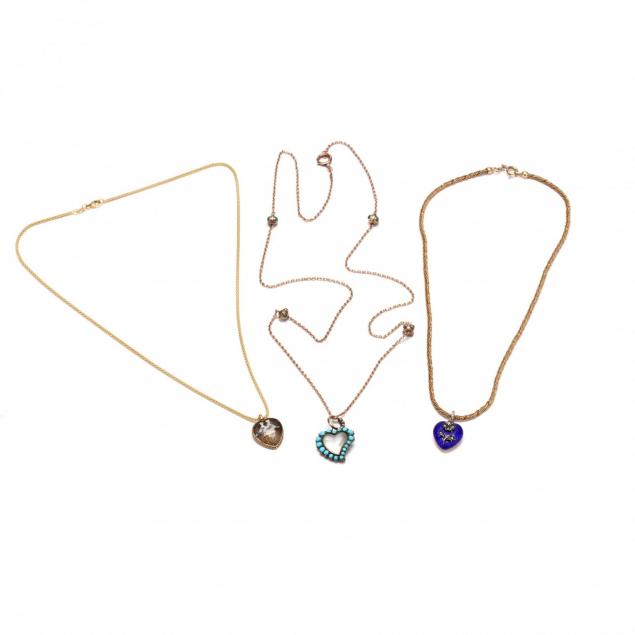 three-antique-gold-and-gemstone-heart-necklaces