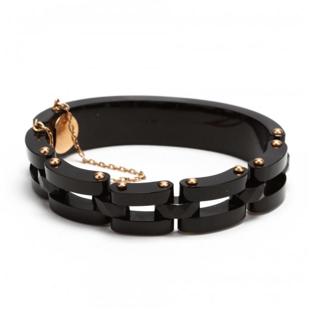 a-gold-and-black-onyx-link-bracelet