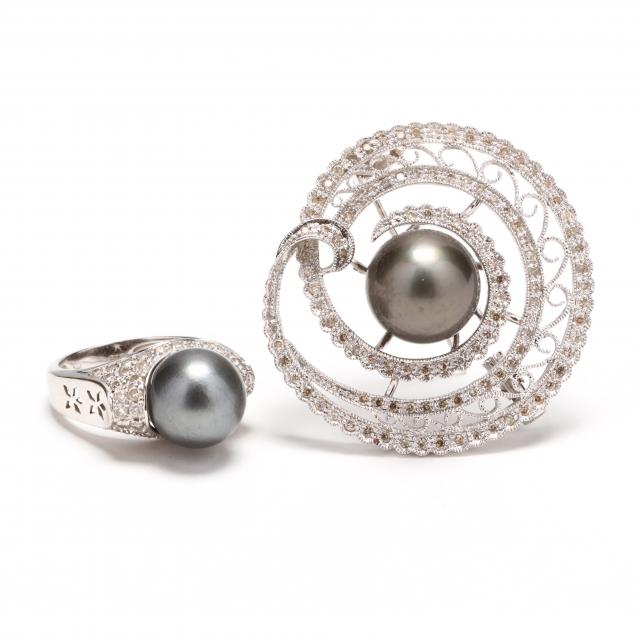 a-white-gold-black-pearl-and-diamond-ring-and-a-brooch