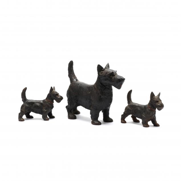 three-scottish-terrier-doorstops