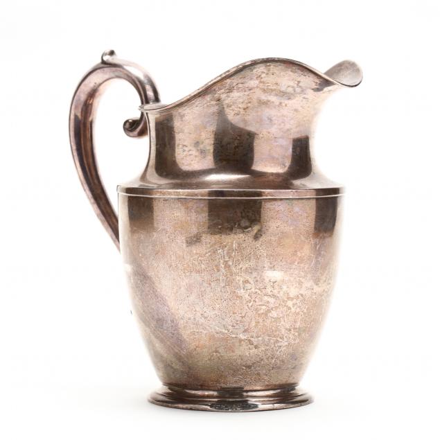 a-sterling-silver-water-pitcher-by-wallace