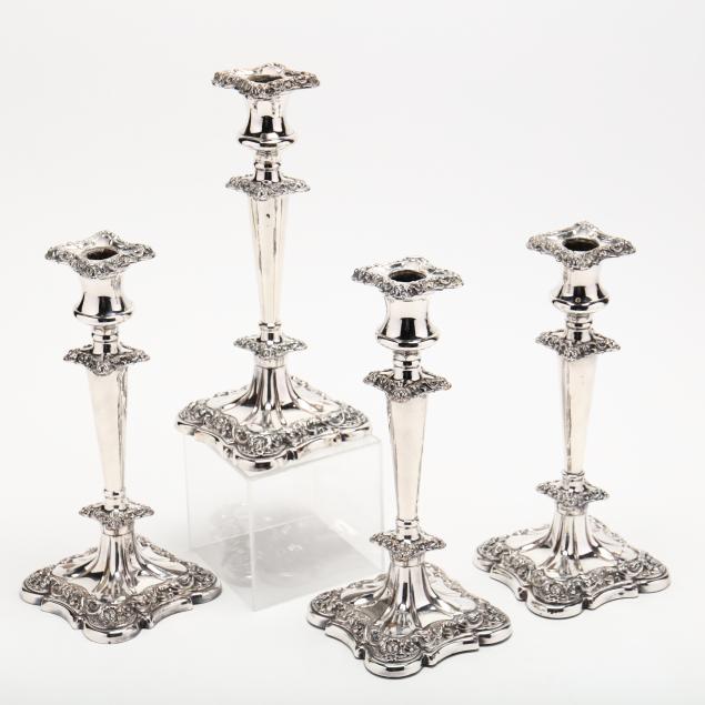 a-set-of-four-sheffield-plate-candlesticks