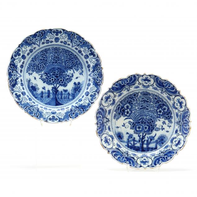 a-pair-of-delft-blue-and-white-tea-tree-chargers