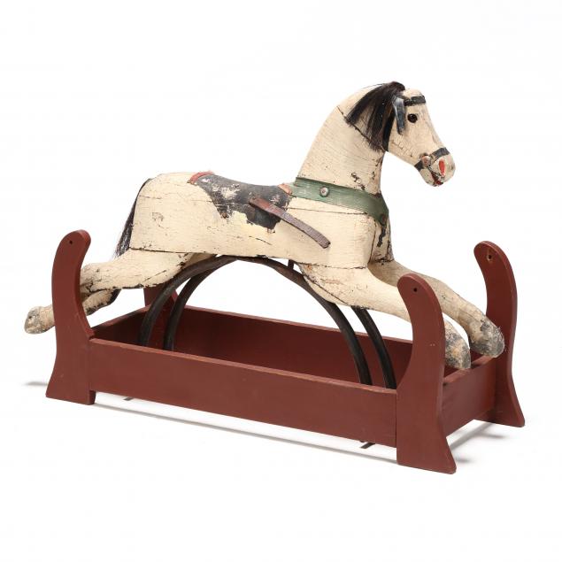 vintage-carved-and-painted-rocking-horse-on-frame