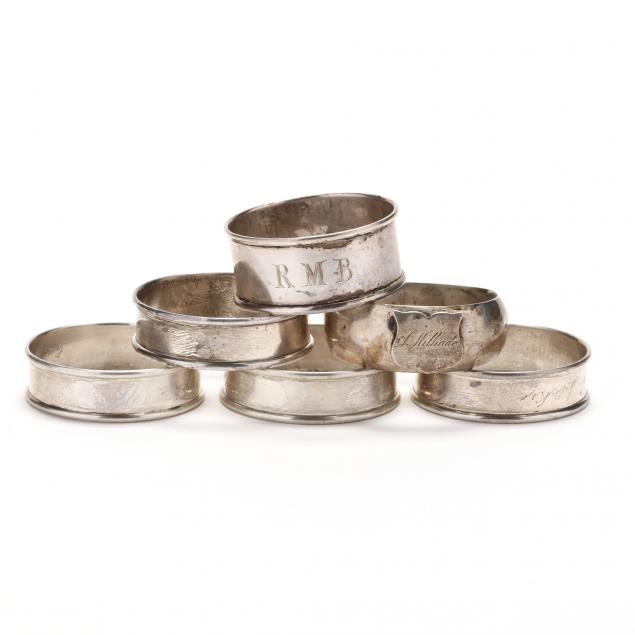 an-assembled-set-of-six-sterling-silver-napkin-rings
