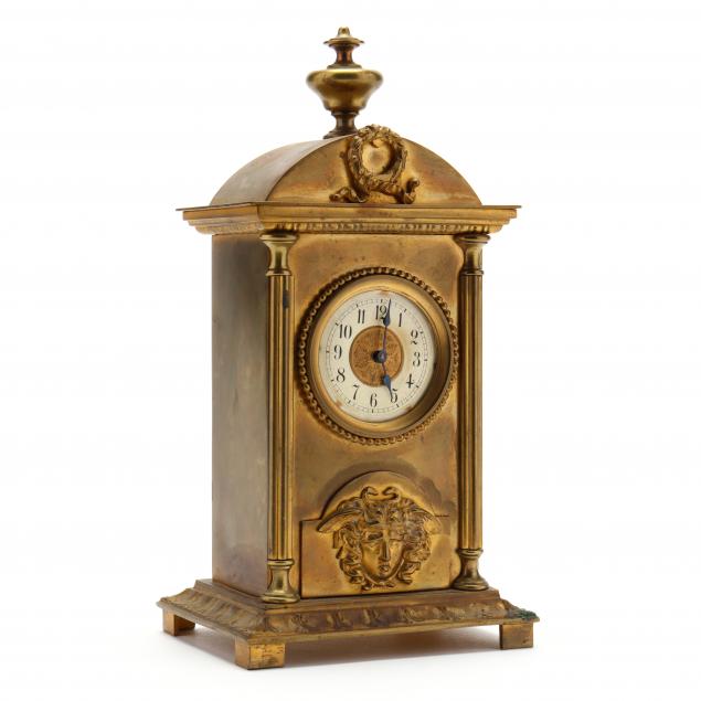 a-french-empire-gilt-bronze-mantel-clock