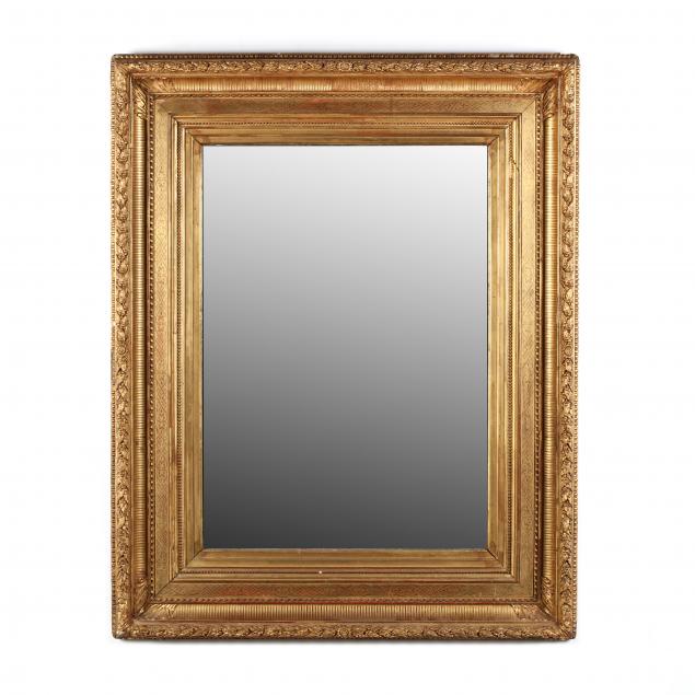 a-large-antique-gilt-composition-frame-with-mirror