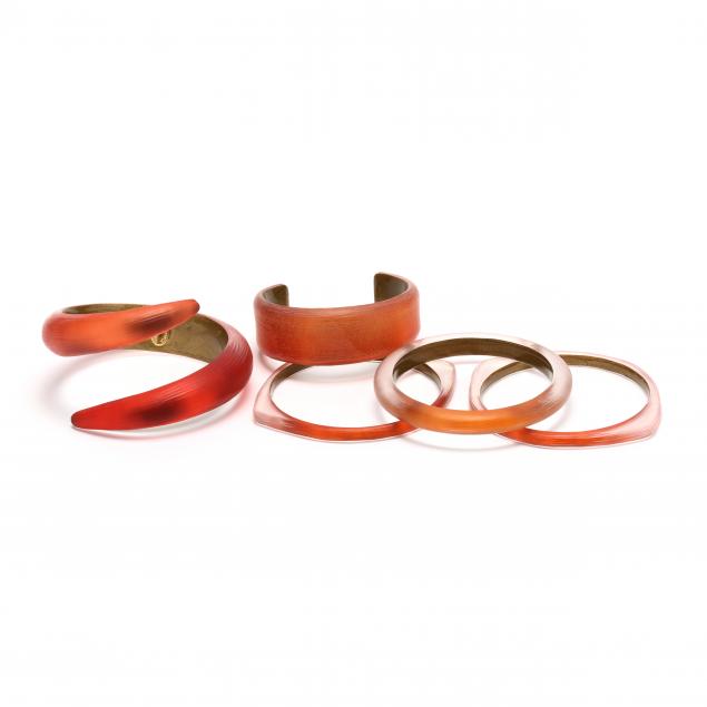 group-of-orange-tone-lucite-bracelets-alexis-bittar