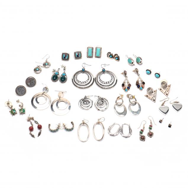a-collection-of-22-pairs-of-silver-earrings