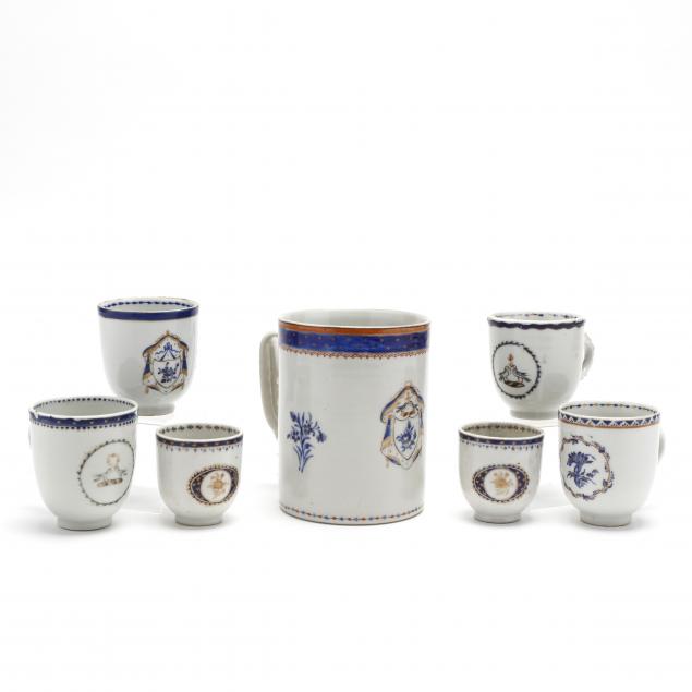 a-group-of-chinese-export-porcelain-armorial-handled-cups