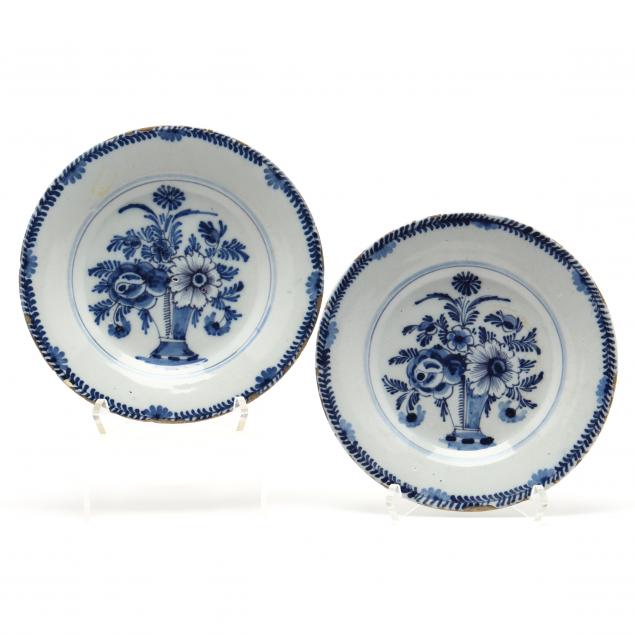 a-pair-of-delft-blue-and-white-plates