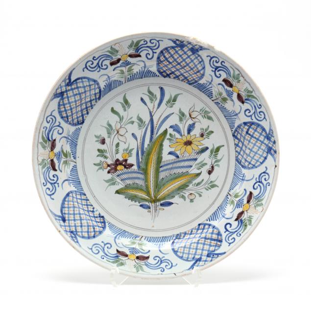 an-english-delft-polychrome-charger