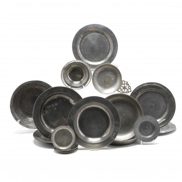 a-group-of-assorted-pewter-dishes