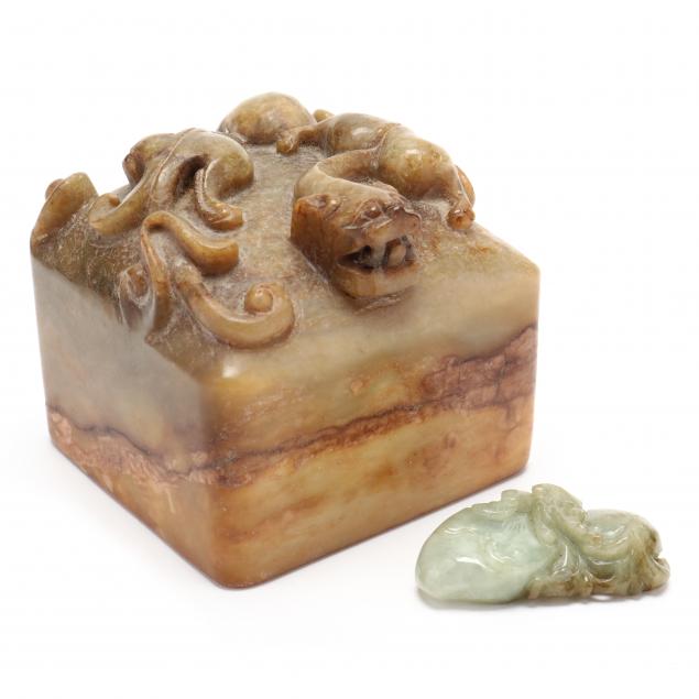 a-chinese-hard-stone-seal-and-a-jade-amulet