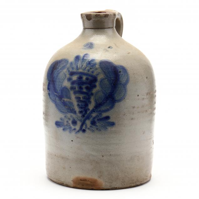 a-stoneware-jug-with-cornucopia-decoration